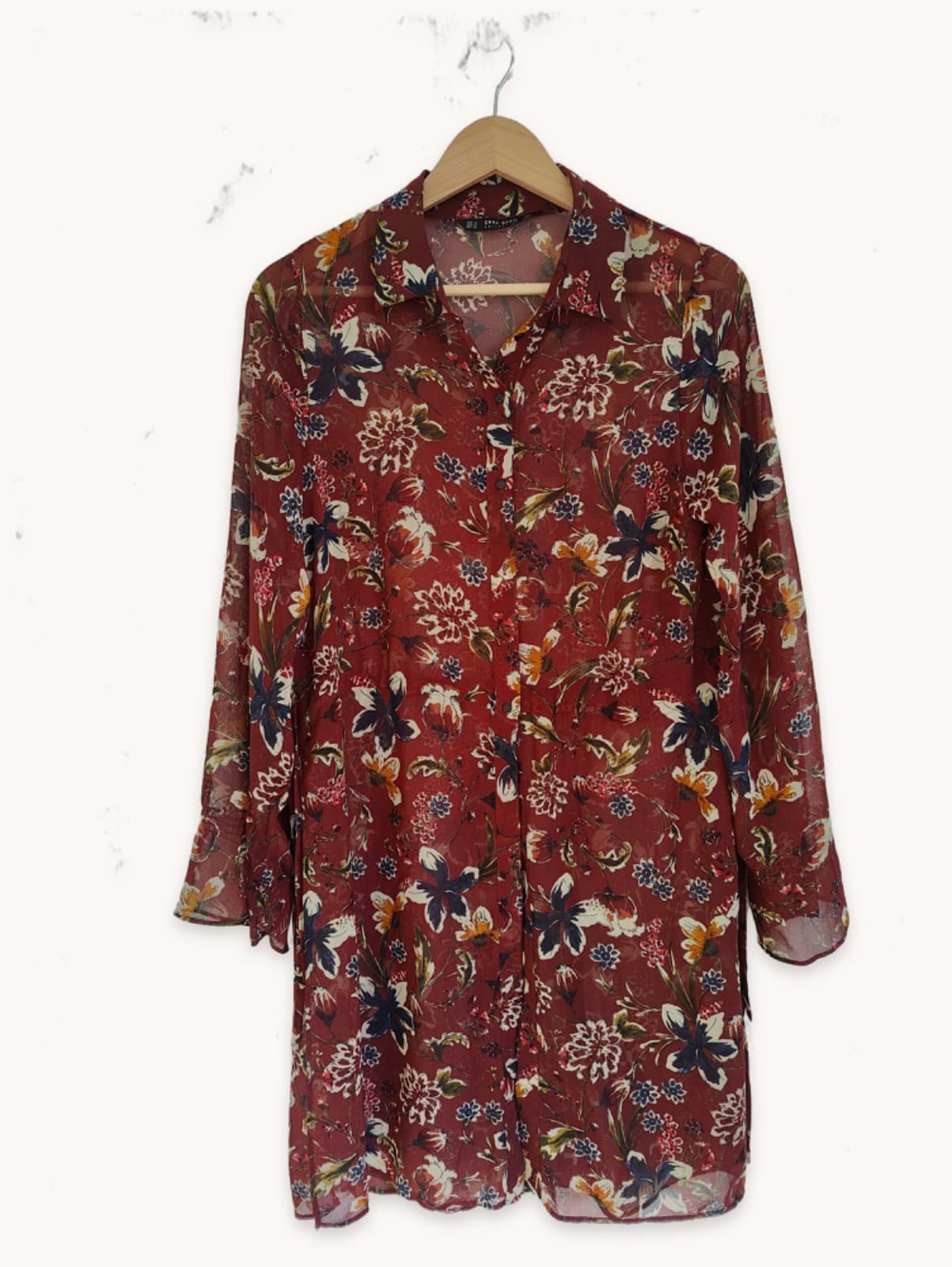 Blusa comprida bordô com estampado floral – Tamanho M